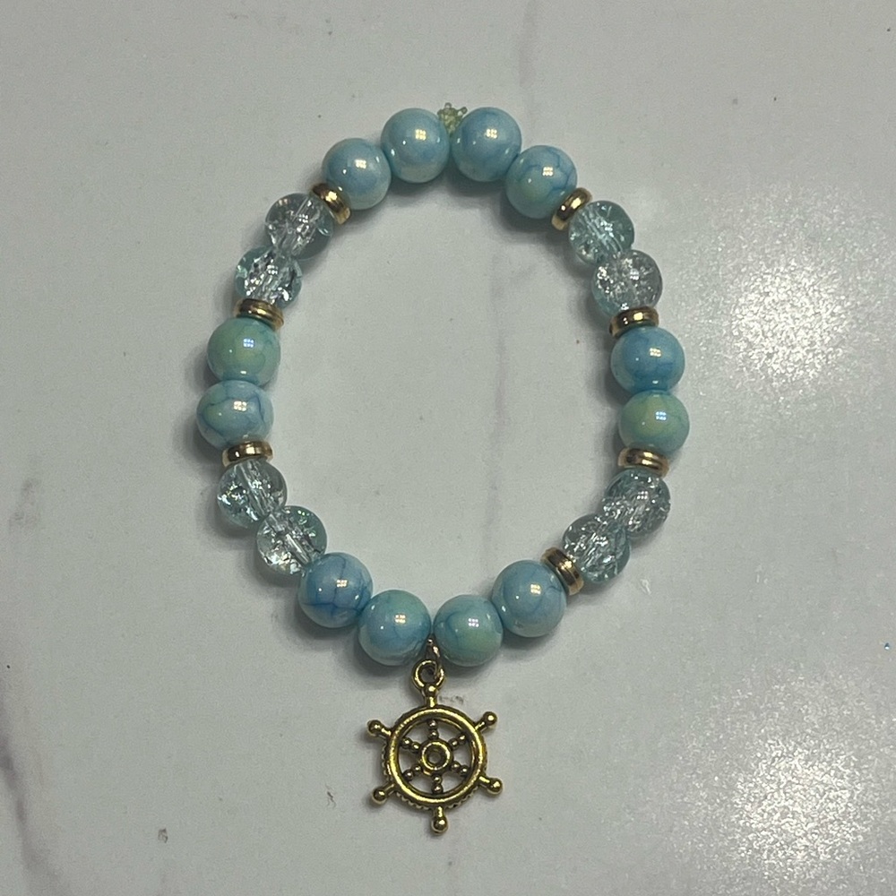 Gold and Blue Beaded Bracelet with ship Charm